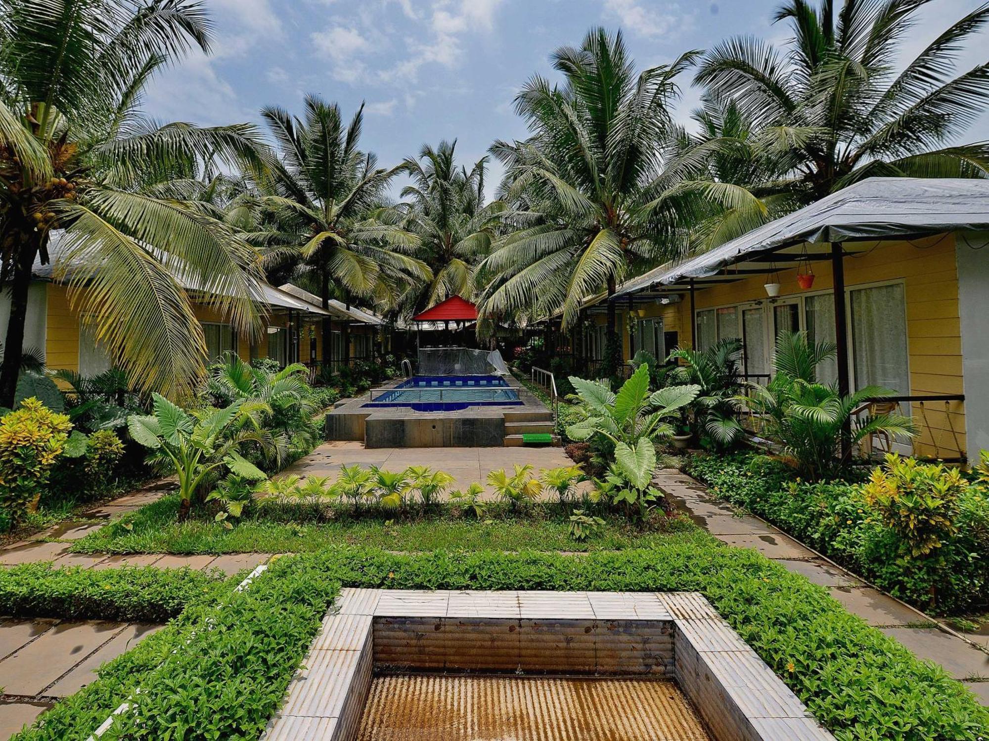 Collection O Retreat Morjim Resort Exteriör bild